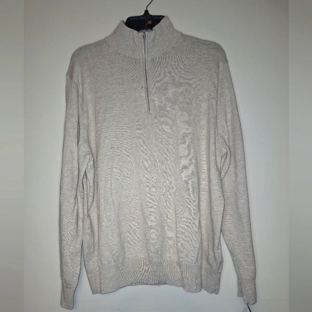 A J.Crew 100% cotton turtleneck sweater in a men's size large. EUC.